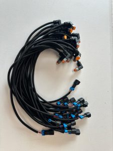 Custom multi-branch wire harness assembly with sealed connectors and corrugated protective loom