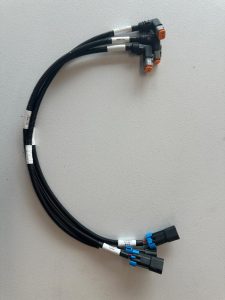 Custom Y-branch wire harness assembly with sealed connectors and corrugated protective sleeve
