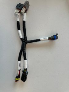 Custom Y-split wire harness assembly with multi-pin connectors and protective corrugated sleeve